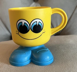 Vintage Deka Footsie Tootsie Mug Cup Yellow & Blue Feet 70s Smiley Face Plastic - Picture 1 of 5