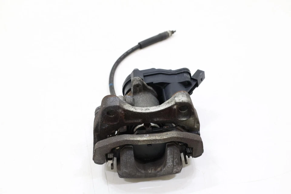 Pinza de freno de disco trasera izquierda MAZDA CX-9 2016-2023 con manguera OEM Foto 1 de 4