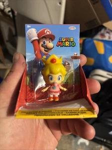 Jakks Pacific - Super Mario Bros. - "Baby Peach" 2,5 pollici (confezione Checklane) - Foto 1 di 2