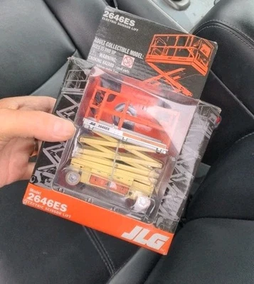 Elevador de tijera diecast JLG escala 1:32 modelo 2646es ¡Nuevo en caja sellado!  Foto 1 de 4
