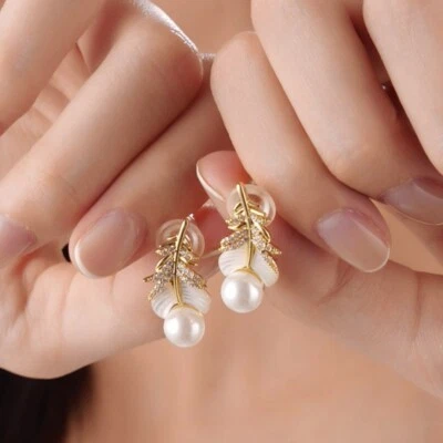 18k yellow gold pearl stud feather 925 silver crystal mother of pearl earrings - Image 1 of 4