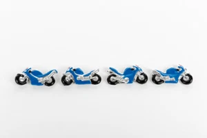 BOMBONIERA COMPLEANNO CALAMITA NASCITA SEGNAPOSTO BIMBO MOTO RESINA 4ASS  - Imagen 1 de 1