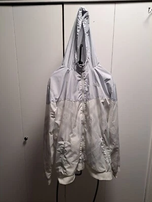 Chaqueta cortavientos con capucha blanca y gris Quiksilver para hombre o mujer Foto 1 de 4