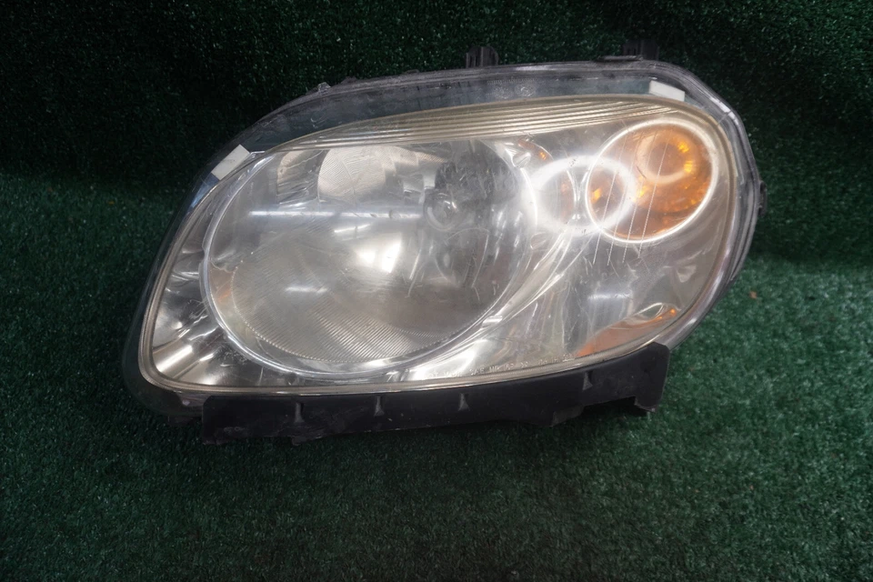 Chevrolet HHR 2009 2010 2011 luz de la cabeza del lado del conductor OEM 15827441 Foto 1 de 3