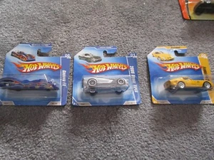 THREE RARE HOT WHEELS SPECIAL CARS FERRARI-GROUND FX - DODGE VIPER - ALL NEW - Picture 1 of 4