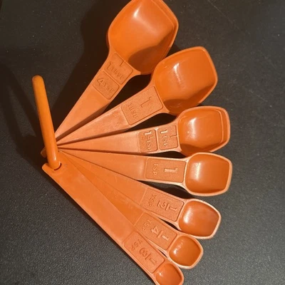 Vintage Tupperware Spoons, 7 Orange Plastic 1970’s Nesting Measuring Spoons - Image 1 of 4