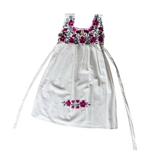 White little girls dress with floral embroidery detail and ties in the back - Picture 1 of 9