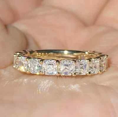 Anillo de eternidad de diamantes simulados de corte Asscher de 1,30 quilates enchapado en oro amarillo de 14 k Foto 1 de 4