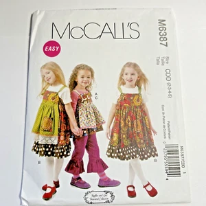McCall’s 6387 Child’s BOHO Top Jumper Pant Size 2-3-4-5 Detachable Apron UNCUT - Picture 1 of 7
