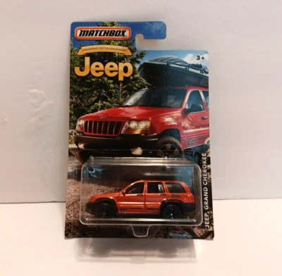 2016 Matchbox 1999 Jeep Grand Cherokee with Raft ~ 75th Anniversary Edition 1/64 - Image 1 of 4