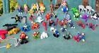 Lot Of 40 Marvel DC Action Figures and weapons toys 