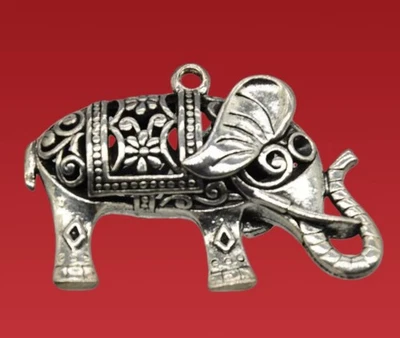 Colgante elefante vintage en tono plata intrincado diseño de filigrana Foto 1 de 4