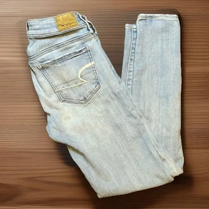Jeans donna American Eagle taglia 0 jegging super super elasticizzato lavaggio chiaro blu - Foto 1 di 11