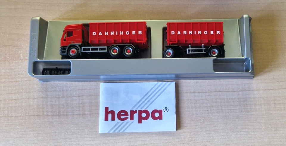 Herpa 144148 IVECO EUROTECH Danninger autotreno cassone scarrabile 1:87 OVP - Immagine 1 di 4