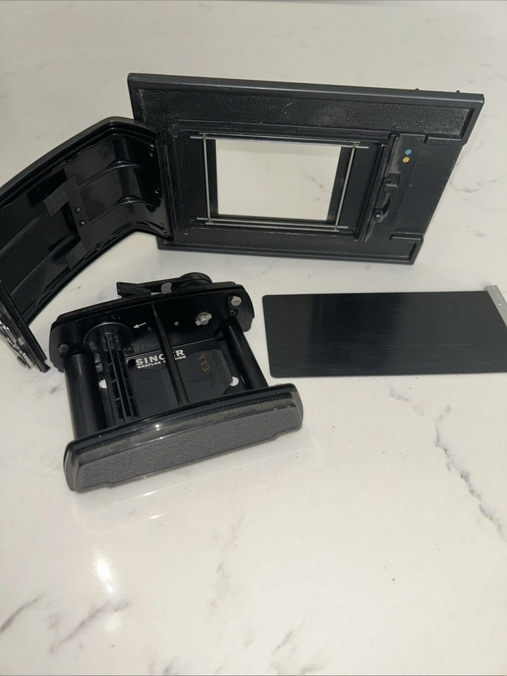 Suporte para 120 rolos Singer Graflex Camera Keith Camera Co. - Imagem 1 de 4