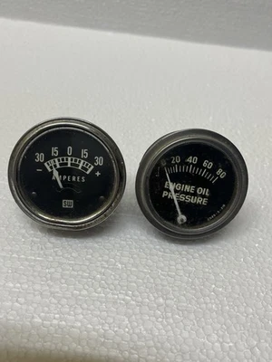 "Medidores de presión y amperios de aceite Stuart Warner de 2,25"" como están" Foto 1 de 4