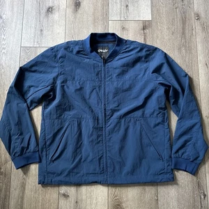 Oakley Golf Tech Jacket Navy Blue Lightweight Water Repellent Men's Large NWOT - Picture 1 of 11