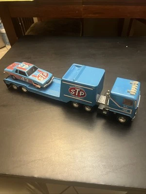 Ertl Richard Petty #43 STP Car Hauler Pressed Steel Trailer Truck W/ Racing Car - Image 1 of 4