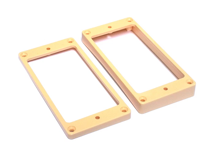 Humbucker Guitar Pickup Mounting Rings • Slanted w/Curved Bottom • Cream - image 1 of 1