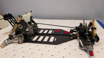Vintage Kyosho Optima Mid w A&L Graphite Trailing arm Chassis used Option House - Image 1 of 4