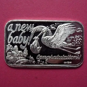A NEW BABY 1984 - FELICITACIONES 1 OZ barra de arte de plata - cigüeña y bebé - casa - Imagen 1 de 12
