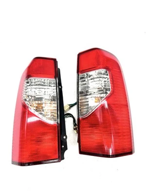 Luces traseras laterales Nissan Xterra 2002-2004 conductor izquierdo pasajero derecho OEM brillantes Foto 1 de 4