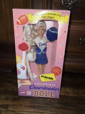 Muñeca animadora universitaria de colección Duke University pelo rubio caja dañada Foto 1 de 4