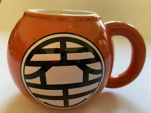 Taza naranja oficial 2017 Dragon Ball Z símbolo 20 oz pintada a mano *usada* - Imagen 1 de 8