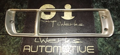 86-89 OEM Mitsubishi Starion intermitente delantero / luz antiniebla moldura metálica 041-3202 R Foto 1 de 4