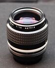 Nikon NIKKOR 35mm f/1.4 Ai-S Lens with HN-3 Lens Hood in Near Mint Condition