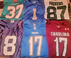 Vintage Fußball Trikot Lot Packers Seahawks Gamecocks Chargers Dolphins Bruins - Bild 1 von 12
