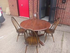 Ercol Extending Dining Table With Four Ercol Spindle Back Chairs. - Picture 1 of 13