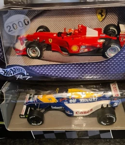 1:24 scale formula 1   cars from 2000  - Picture 1 of 2