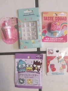 Hello Kitty Blind Bag - Menge 5 neue versiegelte Artikel Lipgloss/Kindernägel/Blindbeutel - Bild 1 von 7