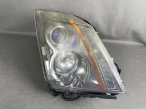 Faro halógeno lateral derecho pasajero Cadillac CTS 2008-2014 FABRICANTE DE EQUIPOS ORIGINALES - Imagen 1 de 19