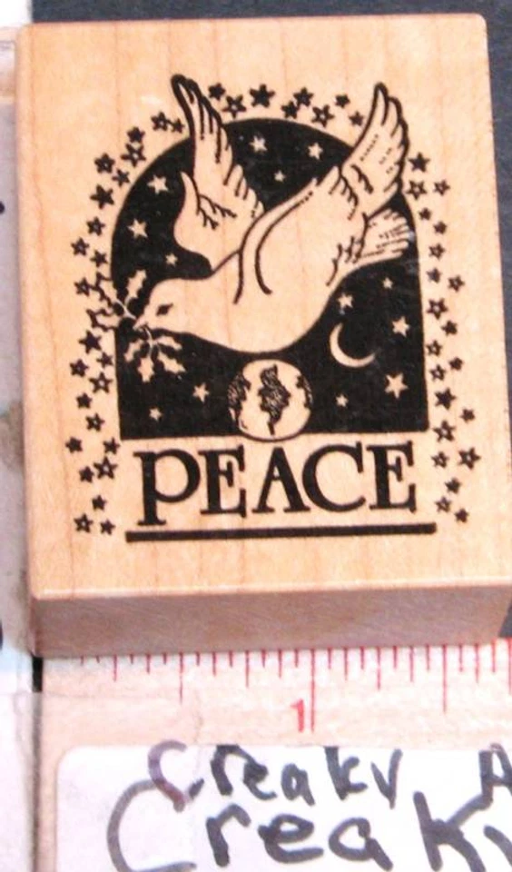 PSX D-344 DOVE OF PEACE WORLD GLOBE STARS MOON RUBBER STAMP RETIRED CREAKYATTIC - Image 1 of 1