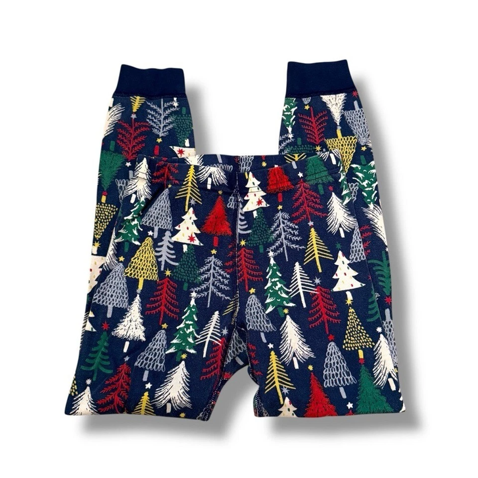Calça pijama Hanna Andersson Long John em árvores cintilantes na marinha tamanho 130 (EUA 8) - Imagem 1 de 4
