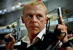 HOT FUZZ: SIMON PEGG 'SGT. NICHOLAS ANGEL'  SIGNED 6x4 ACTION PHOTO+COA - Picture 1 of 1