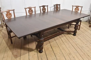 Oak extending dining table by Maple and Co - Picture 1 of 13