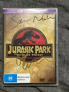Signed Sam Neill Jeff Goldblum Jurassic Park Ultimate Trilogy DVD Photo Proof - Picture 1 of 3