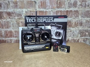 Juego de transmisor y receptor Acoms Techniplus AM 27 MHz 2 canales nitro/eléctrico radio RC - Imagen 1 de 16