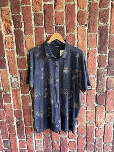 Travis Mathew Mens Blue Floral Pattern Golf Polo Makai Princeville Size 2XL NWT - Picture 1 of 3