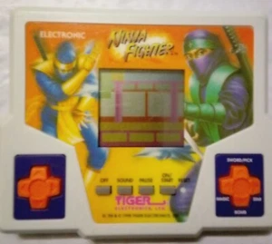 Vintage 1998 Tiger Ninja Fighter Electronic Handheld Game Tested/Works - Picture 1 of 3