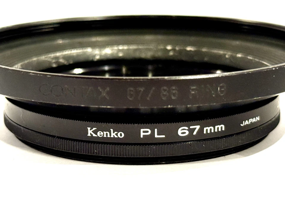 [EXC5] Contax 67/86 ring Metal Step Up Ring w/ Kenko PL filter - Image 1 of 4