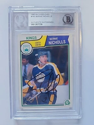 TARJETA RC FIRMADA POR BERNIE NICHOLLS 1983-84 O-PEE-CHEE ROOKIE BAS BECKETT AUTO Foto 1 de 2
