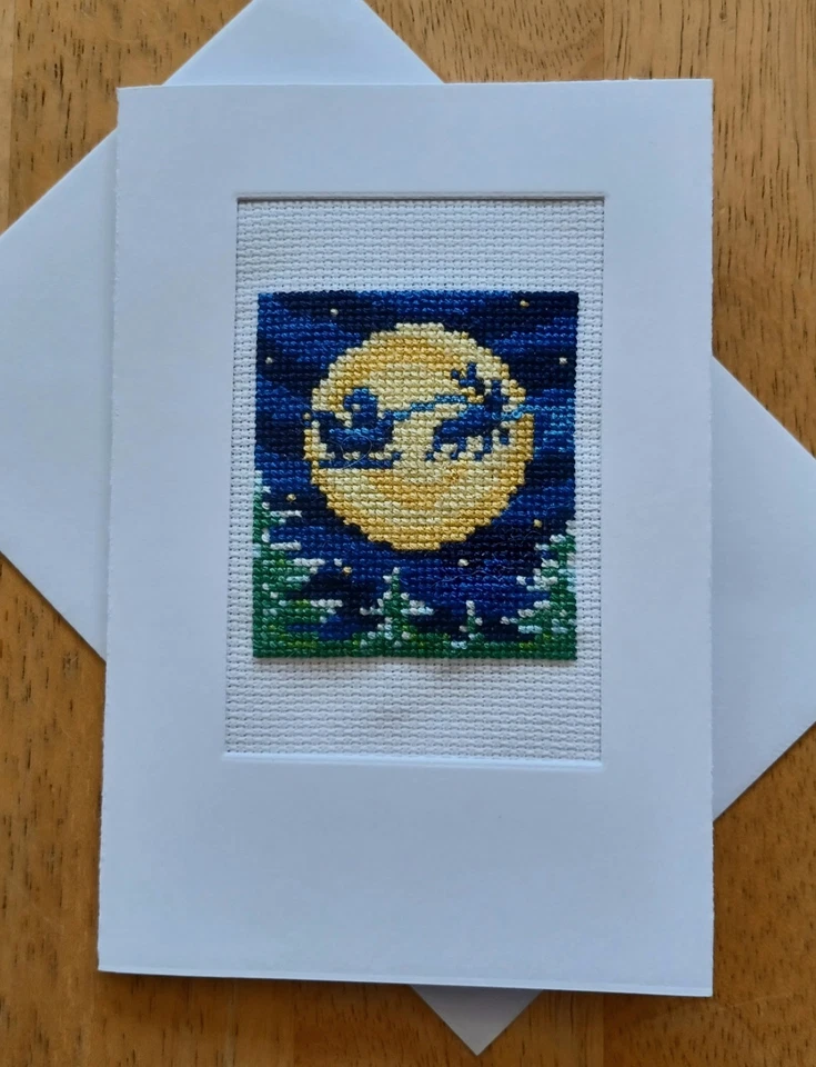 Luna trineo de Santa. Punto X acabado. Tarjeta blanca, inserto en blanco y sobre. Foto 1 de 1