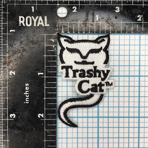 2003-18 TRASHY CAT WOMENS BICYCLE CLOTHING ADVERTISING 2.25" IRON ON CLOTH PATCH - Picture 1 of 2