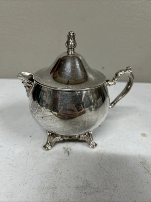 Crema de patas vintage Oneida plateada Foto 1 de 4