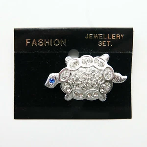 SILVER TURTLE BROOCH WITH SPARKLING DIAMANTE EYES IN BLUE / ORANGE / TURQUOISE - Picture 1 of 6