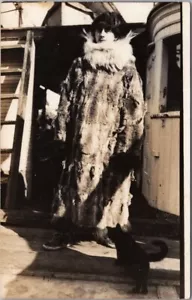 Vintage 1930s ALASKA Real Photo RPPC Postcard Man in Fur Coat on Fishing Boat - Picture 1 of 2